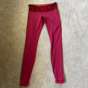 Lululemon reversible leggings in a size 6. Full length. Red snakeskin waistband.